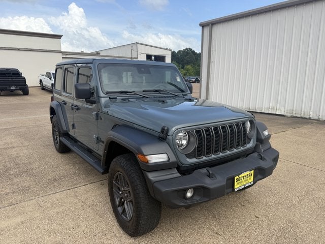 2025 Jeep Wrangler 4-Door Summit 4x4 in Anvil Clearcoat — front three-quarter view