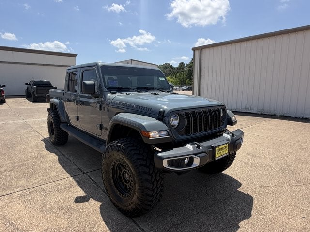 2026 Jeep Gladiator GLADIATOR TEXAS TRAIL 4X4 in Anvil Clear-Coat Exterior Paint — front three-quarter view