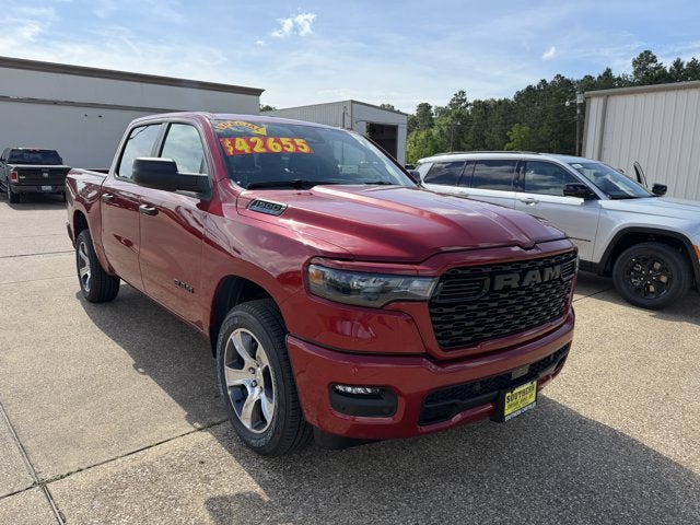 2026 RAM Ram 1500 RAM 1500 EXPRESS CREW CAB 4X2 5'7' BOX in Molten Red Pearl-Coat Exterior Paint — front three-quarter view