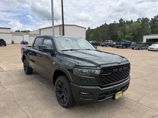 2026 RAM Ram 1500 RAM 1500 LONE STAR CREW CAB 4X4 5'7' BOX in Serrano-Green Metallic Exterior Paint — front three-quarter view