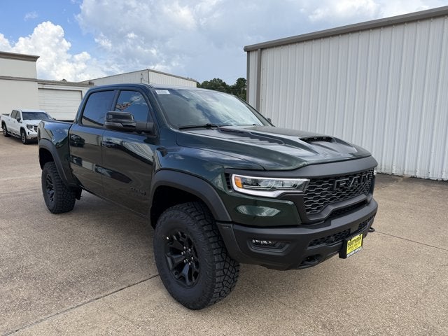 2026 RAM Ram 1500 RAM 1500 RHO CREW CAB 4X4 5'7' BOX in Serrano-Green Metallic Exterior Paint — front three-quarter view