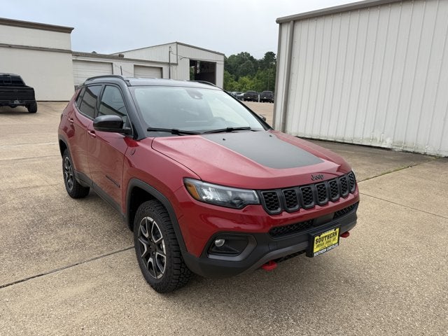 2026 Jeep Compass COMPASS TRAILHAWK 4X4 in Red Hot Pearl-Coat Exterior Paint — front three-quarter view