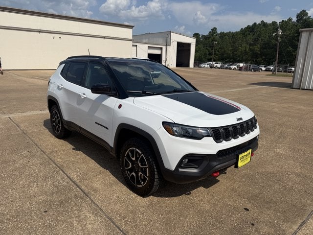 2025 Jeep Compass Trailhawk 4x4 in Bright White Clearcoat — front three-quarter view