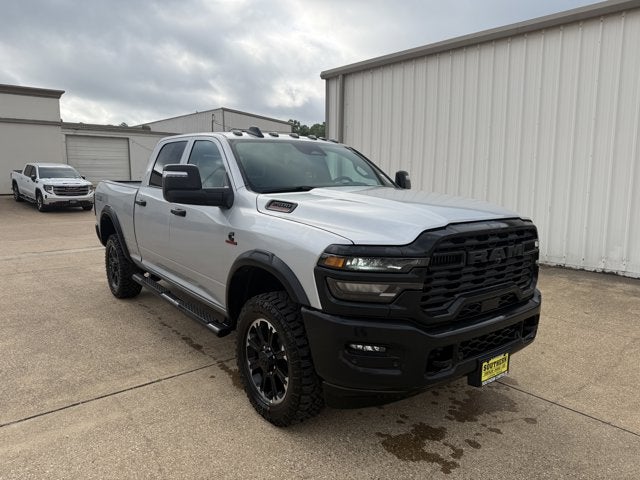 2026 RAM Ram 2500 RAM 2500 WARLOCK CREW CAB 4X4 6'4' BOX in Silver-Zynith Exterior Paint — front three-quarter view