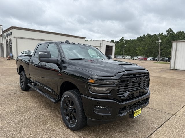 2026 RAM Ram 2500 RAM 2500 BLACK EXPRESS CREW CAB 4X4 6'4' BOX in Diamond Black Crystal Pearl-Coat Exterior Paint — front three-quarter view