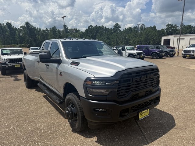 2026 RAM Ram 3500 RAM 3500 TRADESMAN CREW CAB 4X4 8' BOX in Silver-Zynith Exterior Paint — front three-quarter view
