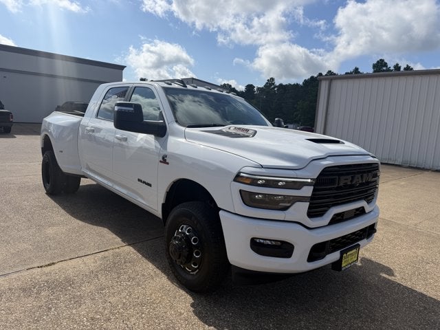 2026 RAM Ram 3500 RAM 3500 LARAMIE MEGA CAB 4X4 6'4' BOX in Bright White Clear-Coat Exterior Paint — front three-quarter view