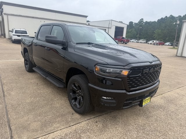 2026 RAM Ram 1500 RAM 1500 EXPRESS CREW CAB 4X4 5'7' BOX in Diamond Black Crystal Pearl-Coat Exterior Paint — front three-quarter view