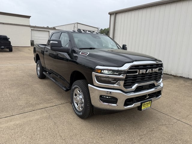 2026 RAM Ram 2500 RAM 2500 TRADESMAN CREW CAB 4X4 6'4' BOX in Diamond Black Crystal Pearl-Coat Exterior Paint — front three-quarter view